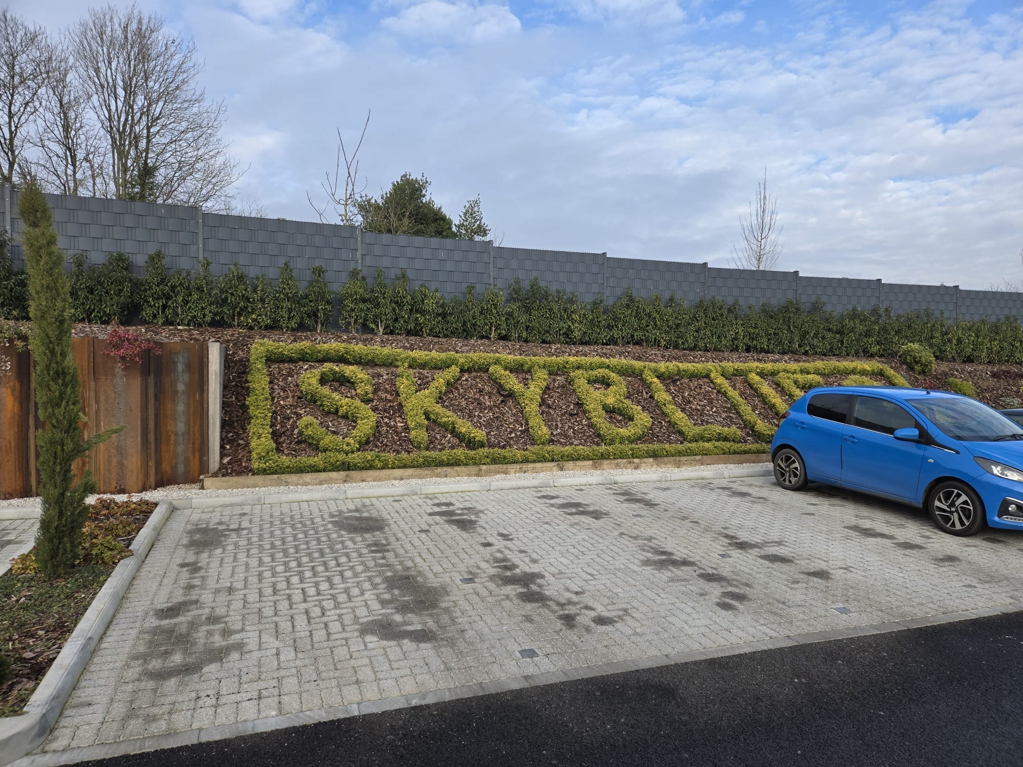 Coventry City FC Sky Blues topiary lettering at training ground entrance